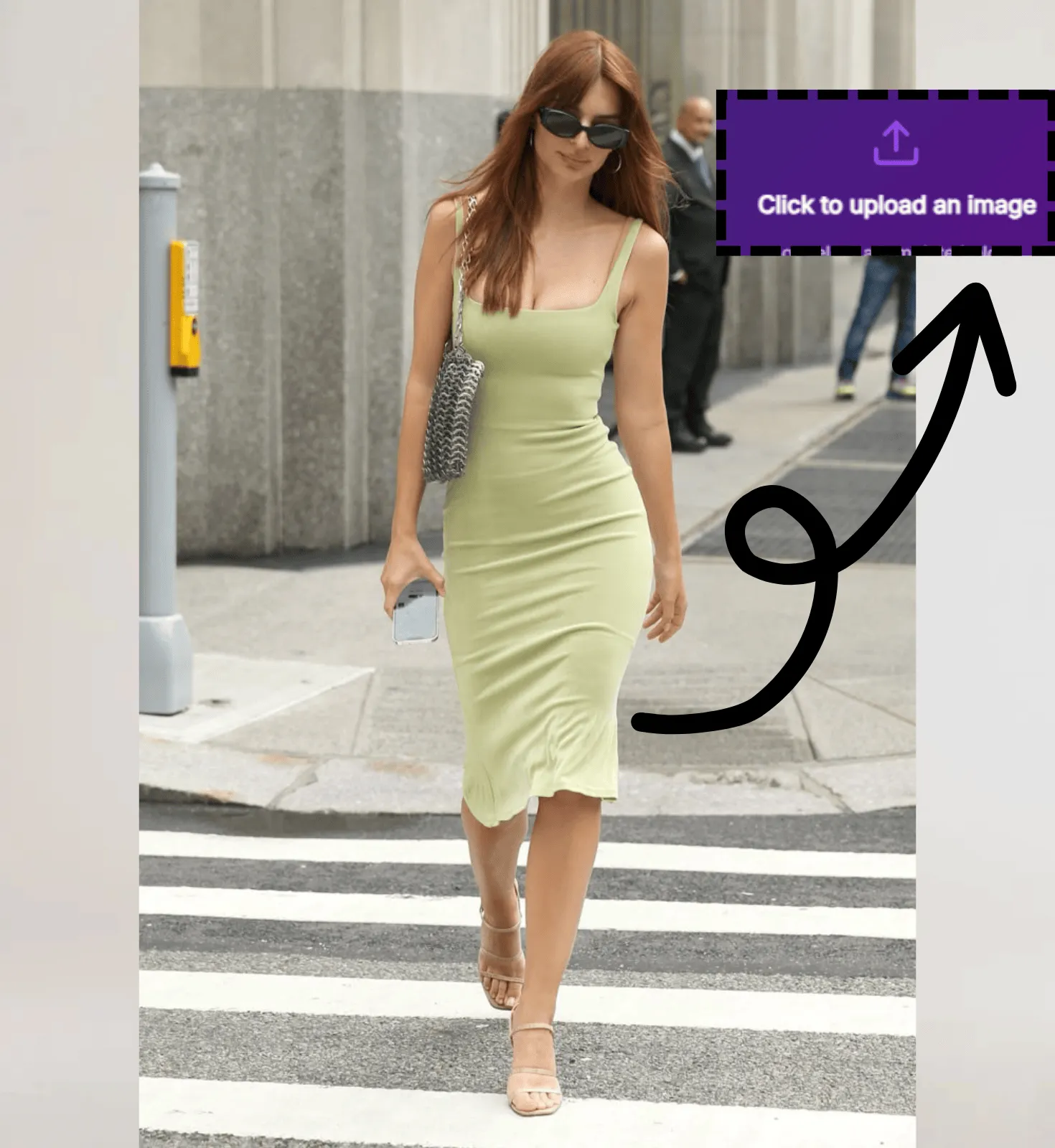 Young female model walking in New York, wearing a sage green knit dress.