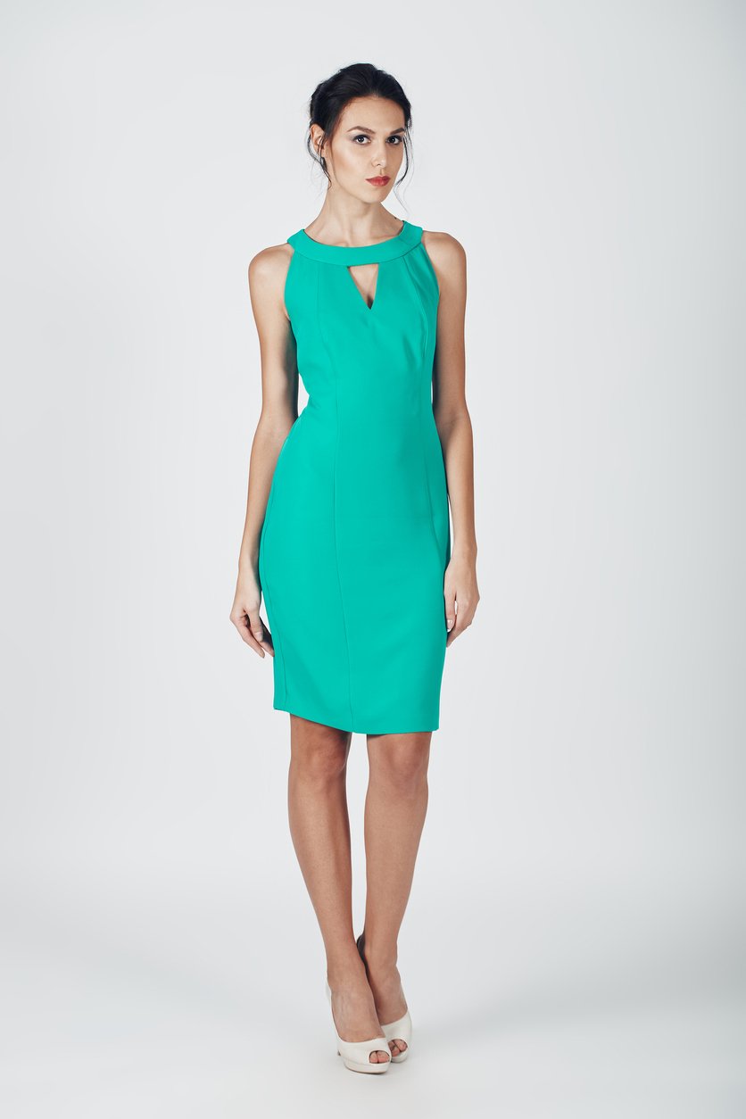 A female model is dressed in a lake blue dress, ready for a clothes swap. Click to change her outfit with the AI clothes changer.